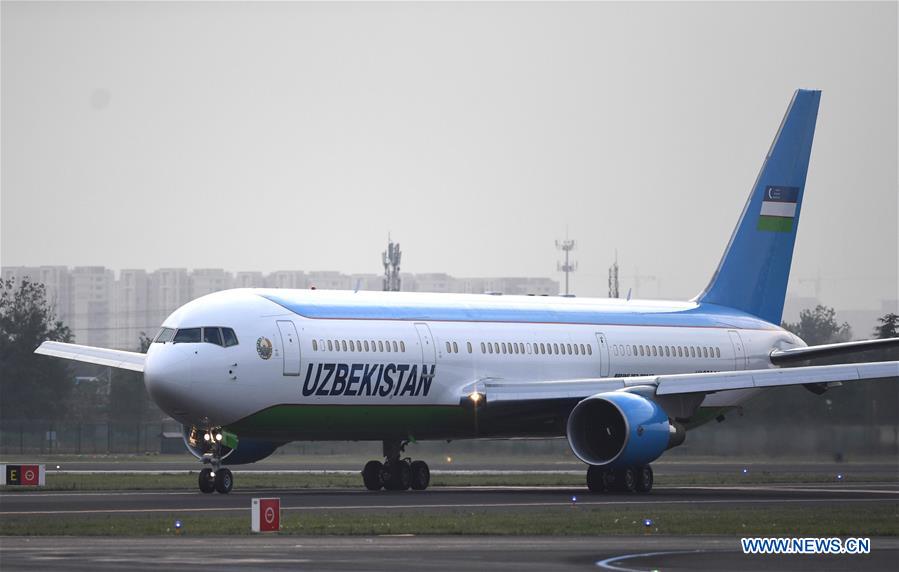 (SCO SUMMIT) CHINA-QINGDAO-SCO-UZBEKISTAN-SHAVKAT MIRZIYOYEV-ARRIVAL (CN)