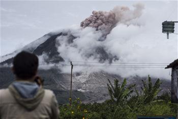 Mount Sinabung spews volcanic ash in Indonesia